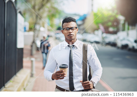Businessman, portrait and walking on coffee break in city to commute to office with lawyer in London. Travel, journey and black man with latte or tea in morning in town with calm and outdoor Businessman, portrait and walking on coffee break in city to commute to office with lawyer in London. Travel, journey and black man with latte or tea in morning in town with calm and outdoor 115436963