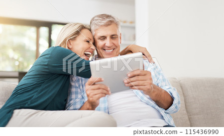 Couple, read and tablet on sofa for social media, laugh and meme online on couch. Technology, internet and app on digital website in home, man and woman person in lounge with touchscreen for comedy 115436990