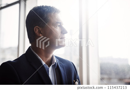 Business man, thinking and window for confidence, vision and determination in professional career as lawyer. Serious, male person or attorney with idea, choice or decision for legal advice in office 115437213