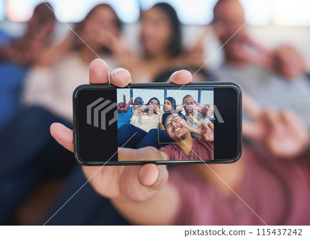 Hand, friends and screen with selfie on smartphone for memory, millennial blog and content creation with happiness for youth. Peace sign, people and bonding with photography, live streaming and smile 115437242