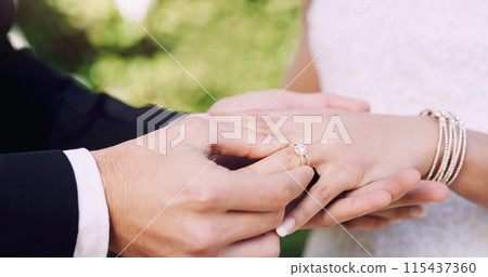 Hands, wedding ring and marriage with commitment for love, event with jewellery for bride. Couple, people and together with symbol for loyalty on partners finger, outdoor with care in Chicago 115437360