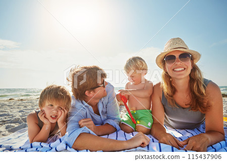 Portrait, relax or kids with parents at sea on holiday vacation or happy family weekend together. Father, fun mother or children siblings at beach for bonding or playing in nature in Spain with love Portrait, relax or kids with parents at sea on holiday vacation or happy family weekend together. Father, fun mother or children siblings at beach for bonding or playing in nature in Spain with love 115437906