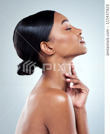 Skincare, woman and face in side view for beauty transformation with facial treatment in studio. Dermatology, female person or model with natural glow from cosmetics or collagen for wellness 115437929