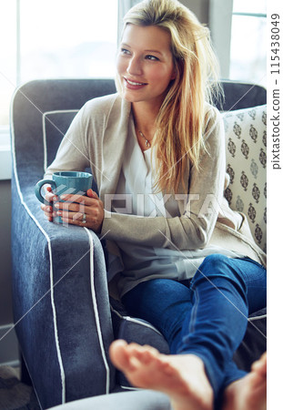 Thinking, smile or woman drinking coffee in home living room for morning breakfast, latte or espresso to relax. Tea, dream or happy person on sofa for peace, calm or planning future decision in house 115438049