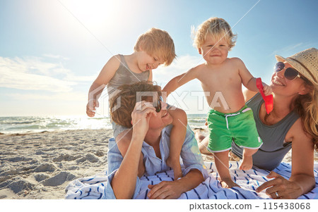 Portrait, piggyback or kids with family at sea for vacation, holiday or summer together with parents. Father, mother or happy children siblings at beach for bonding, love or playing by ocean to relax Portrait, piggyback or kids with family at sea for vacation, holiday or summer together with parents. Father, mother or happy children siblings at beach for bonding, love or playing by ocean to relax 115438068