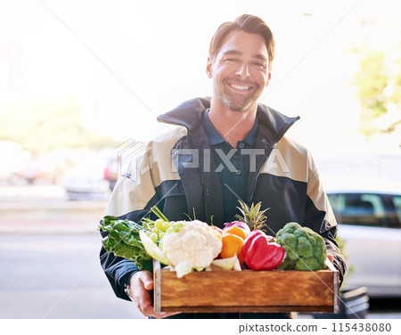Delivery man, smile and box of vegetables groceries at front door as courier service for grocery store. Carrier, happy and portrait with package or product of healthy food for customer by supermarket Delivery man, smile and box of vegetables groceries at front door as courier service for grocery store. Carrier, happy and portrait with package or product of healthy food for customer by supermarket 115438080