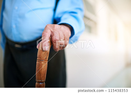 Retirement, hand and senior man with walking stick in closeup for balance, support and injury. Health and male person with disability and cane for mobility, rehabilitation and recovery for arthritis Retirement, hand and senior man with walking stick in closeup for balance, support and injury. Health and male person with disability and cane for mobility, rehabilitation and recovery for arthritis 115438353