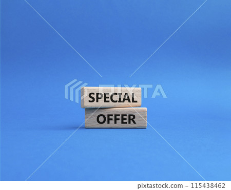 Special offer symbol. Concept word Special offer on wooden blocks. Beautiful blue background. Business and Special offer concept. Copy space 115438462