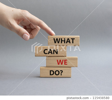 What can we do symbol. Wooden blocks with words What can we do. Businessman hand. Beautiful grey background. Business and What can we do concept. Copy space. What can we do symbol. Wooden blocks with words What can we do. Businessman hand. Beautiful grey background. Business and What can we do concept. Copy space. 115438580