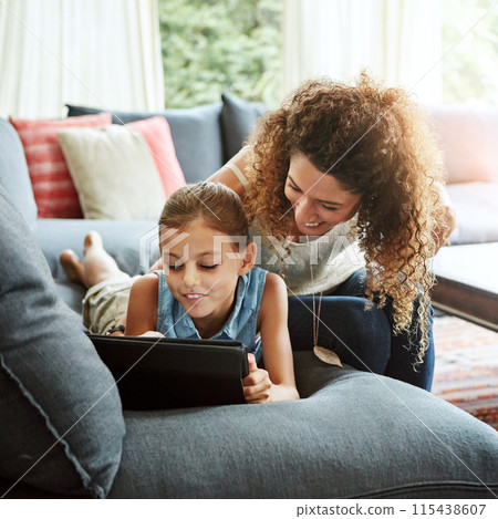 Woman, tablet and child in laughing as family on weekend, break at home for e learning or movies. Excited, people and lounge for relax, together and bonding as parent for growth, development or love 115438607