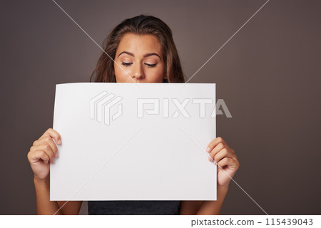 Woman, poster and studio background for instruction with mockup space for advertising, marketing and tips. Female person, sign board and presentation with promotion, information and paper card 115439043