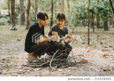 Asian couple sweet in tent inside on they camping trip, traveller relax and sleep togather in out door and camping trip 115439205