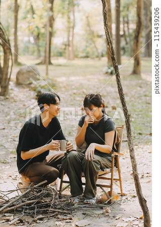 Asian couple sweet in tent inside on they camping trip, traveller relax and sleep togather in out door and camping trip Asian couple sweet in tent inside on they camping trip, traveller relax and sleep togather in out door and camping trip 115439206