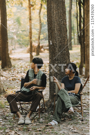 Asian couple sweet in tent inside on they camping trip, traveller relax and sleep togather in out door and camping trip 115439260