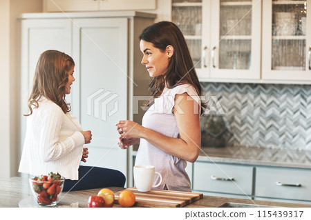 Counter, mother and chat with girl, kitchen or bonding in weekend, house and kid with smile. Home, child and mom with daughter, talking and together in morning, peace or happiness in apartment Counter, mother and chat with girl, kitchen or bonding in weekend, house and kid with smile. Home, child and mom with daughter, talking and together in morning, peace or happiness in apartment 115439317