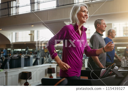 Active, cardio and senior woman on treadmill in gym for health, wellness and body exercise. Fitness, athlete and elderly people on running equipment for endurance workout or training in sports center Active, cardio and senior woman on treadmill in gym for health, wellness and body exercise. Fitness, athlete and elderly people on running equipment for endurance workout or training in sports center 115439327