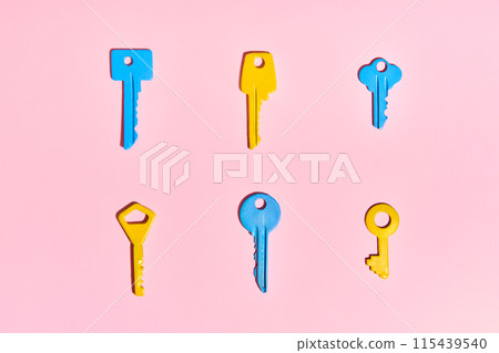 Colorful keys on pink background. Colorful keys on pink background. 115439540