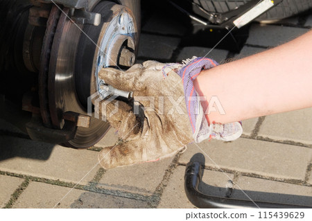 Wheel balancing or repair and change car tire. Car repair and service concept. 115439629