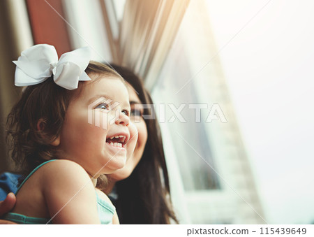Mother, baby and glass in apartment with window, love and family bonding with view together or girl toddler. Childhood development, growth and curious or caring, woman and parenthood in house 115439649