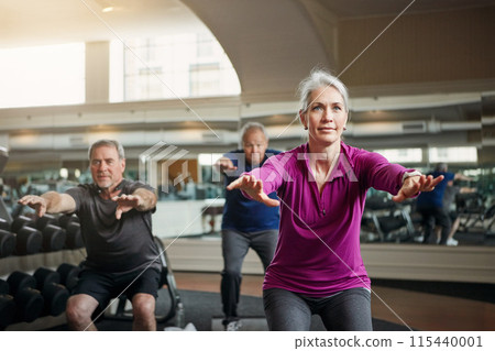 Mature group, woman and squat with fitness in gym, balance or coach for muscle development in class. Senior group, men and exercise for legs, health or workout together in retirement at wellness club Mature group, woman and squat with fitness in gym, balance or coach for muscle development in class. Senior group, men and exercise for legs, health or workout together in retirement at wellness club 115440001