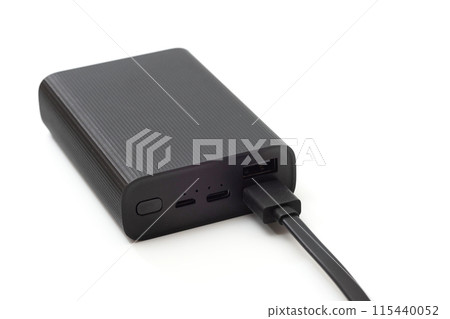 Autonomous external battery for charging mobile and other devices, isolated on a white background. 115440052