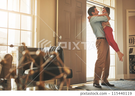 Father, hug and kid at door for welcome home, hello and excited reunion after business trip or travel. Happy family, man or dad embrace child, girl or daughter for support, care or love with security 115440119