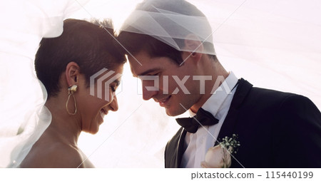 Couple, forehead and wedding veil for love in outdoor, marriage and commitment at ceremony. People, touch and loyalty in relationship, partnership and trust in support or together for celebration 115440199