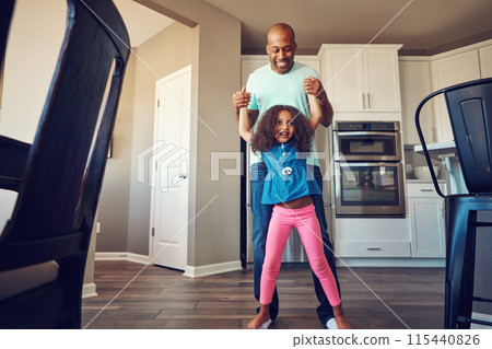 Dancing, happy and father with girl in home for bonding, relationship and fun together on weekend. Family, parenting and dad with child in kitchen for relax, playing and teaching dance move to music 115440826