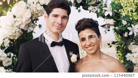 Wedding, man and woman with smile, portrait and happy for commitment, celebration and ceremony for couple. Venue, lovers and people with love, flowers and bride with groom, marriage and event in park Wedding, man and woman with smile, portrait and happy for commitment, celebration and ceremony for couple. Venue, lovers and people with love, flowers and bride with groom, marriage and event in park 115440987