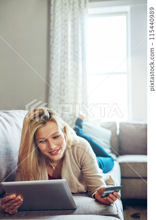 Woman, credit card and tablet or relax on sofa, fintech and online transaction for shopping in home. Customer, internet payment and sale app or banking, ecommerce and happy for apartment purchase 115440989