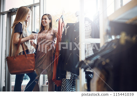 Fashion, shopping or friends with decision for clothes, sales or discount at luxury mall. Smile, retail store or customer with fabric at boutique for choice, help or advice with women drinking coffee 115441039