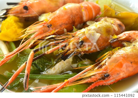 boiled spicy mixed vegetable topping grilled river shrimp soup on plate 115441092