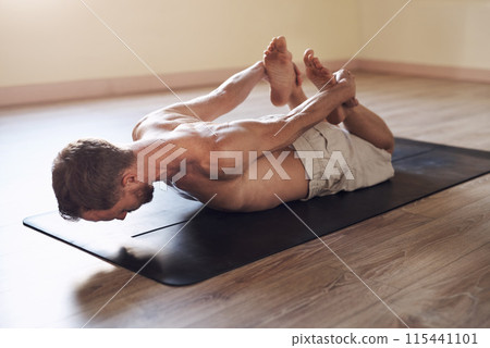 Man, fitness and stretch for bow in yoga class, wellness and calm exercise for workout or health club or balance. Pilates, holistic and mindfulness body healing, zen and meditation with yogi on floor Man, fitness and stretch for bow in yoga class, wellness and calm exercise for workout or health club or balance. Pilates, holistic and mindfulness body healing, zen and meditation with yogi on floor 115441101