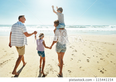 Happy family, walking and holding hands at beach in summer for relax, holiday and travel in Miami. Parents, children and people at ocean with back for vacation, trust and bonding together by water Happy family, walking and holding hands at beach in summer for relax, holiday and travel in Miami. Parents, children and people at ocean with back for vacation, trust and bonding together by water 115441154