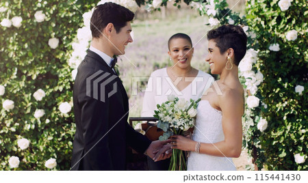 Couple, marriage and wedding with flowers, smile and love for future, commitment and celebration. Bride, man and vows together with minister, happiness and bouquet for event, union and ceremony 115441430