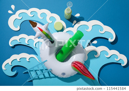 Tanning agents on a beach lounger, against the background of waves. 115441584