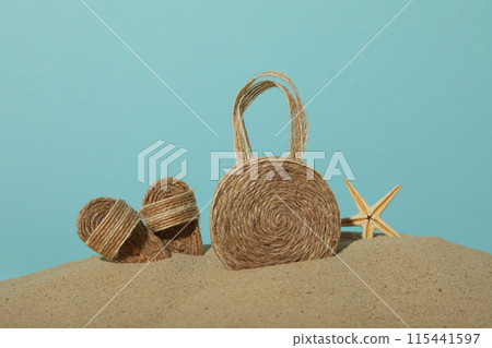 Miniature summer things for relaxing on the beach, near the sea. Miniature summer things for relaxing on the beach, near the sea. 115441597