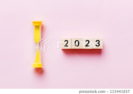 New Year 2023 sand timer. Resolution, time, plan, goal, motivation, reboot, countdown and New Year holiday concepts. Hourglass with number 2023 115441837