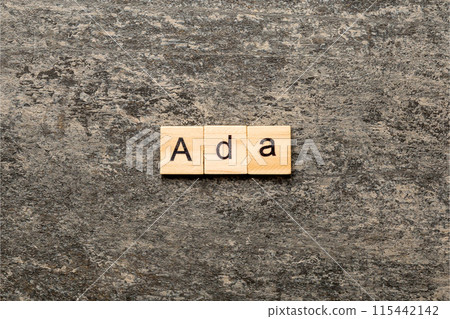 ADA word written on wood block. ADA text on table, concept 115442142