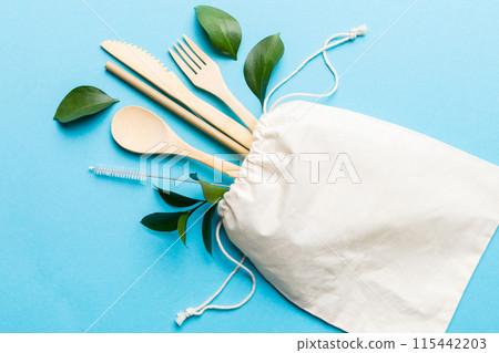 Eco friendly reusable recyclable white eco bag with kitchenware on Colored background. Concept zero waste 115442203