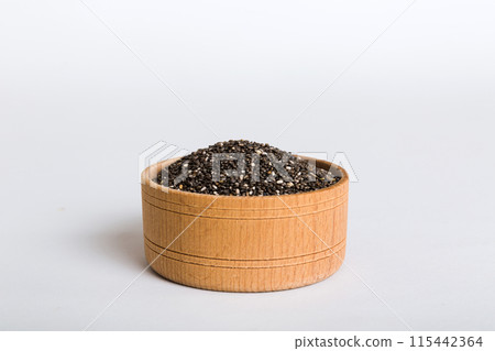 Chia seeds in bowl on colored background. Healthy Salvia hispanica in small bowl. Healthy superfood 115442364