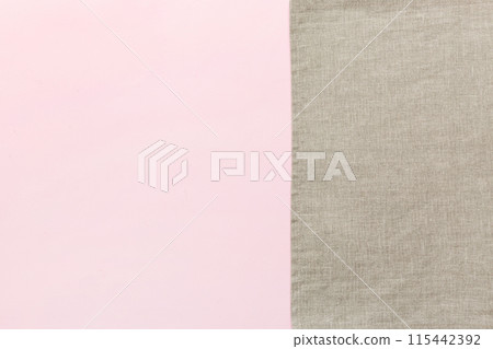 top view with gray kitchen napkin isolated on table background. Folded cloth for mockup with copy space, Flat lay. Minimal style top view with gray kitchen napkin isolated on table background. Folded cloth for mockup with copy space, Flat lay. Minimal style 115442392