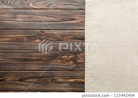 top view with gray kitchen napkin isolated on table background. Folded cloth for mockup with copy space, Flat lay. Minimal style 115442494