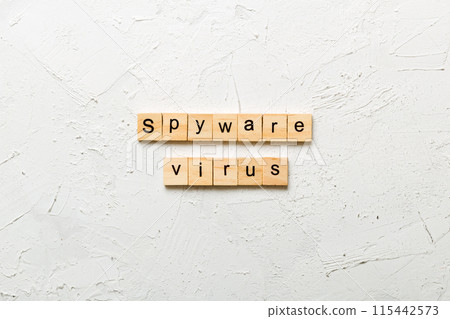 Spyware virus word written on wood block. Spyware virus text on cement table for your desing, concept 115442573