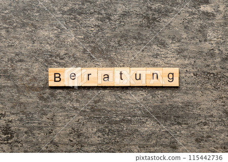 Beratung word written on wood block. Beratung text on cement table for your desing, concept 115442736