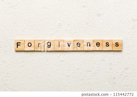 forgiveness word written on wood block. forgiveness text on table, concept forgiveness word written on wood block. forgiveness text on table, concept 115442772