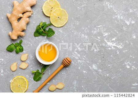 Natural cold and flu home remedies. Natural ingredients for immunity stimulation and viruses protection. top view flat lay Natural cold and flu home remedies. Natural ingredients for immunity stimulation and viruses protection. top view flat lay 115442824