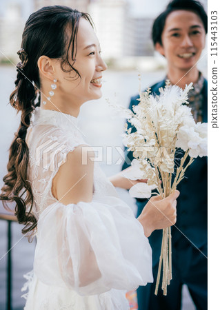 Bride and groom escorting the bride Bride and groom escorting the bride 115443103