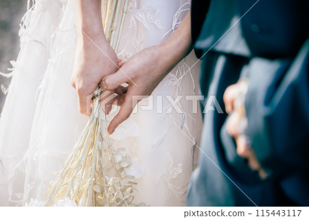 Wedding couple's hands Wedding couple's hands 115443117