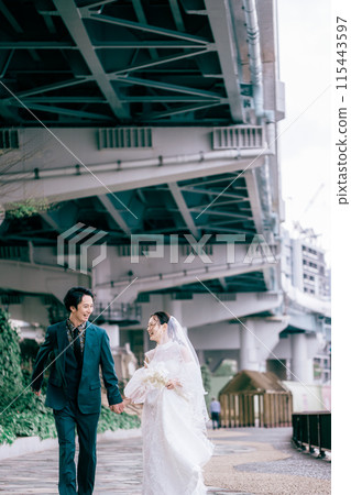 Couple taking location photo wedding photos 115443597